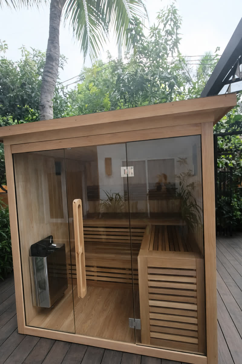 Garden sauna cabin with glass door and heater in Bali