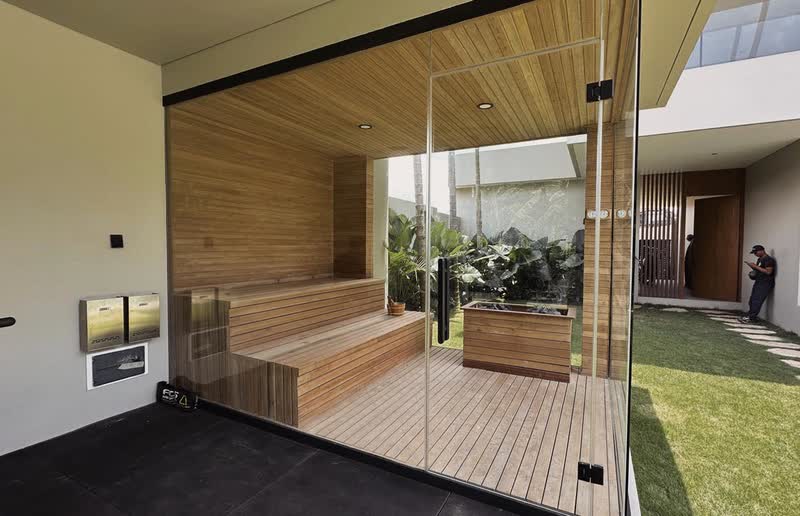 Modern sauna exterior with glass front in a Bali property