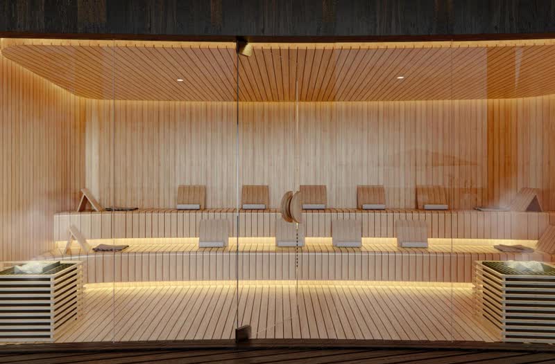 Premium sauna interior in Bali with cedar benches and backlit lighting