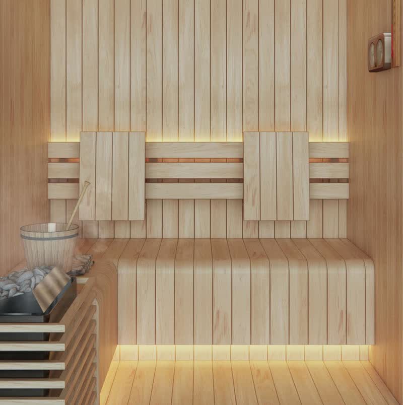 Renewed cedar sauna interior with bench and bucket, Bali