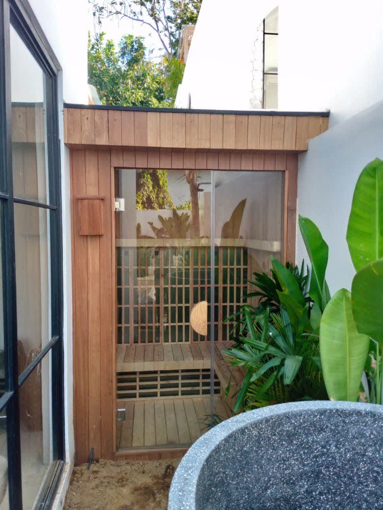 Villa sauna exterior surrounded by tropical planting, Bali